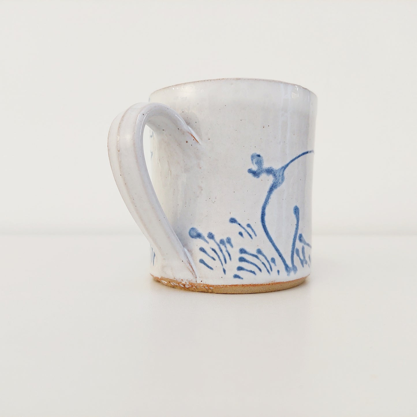 Handcrafted Earthenware Mug – Hans Ullrich | Blue & White Pig & Bird Design