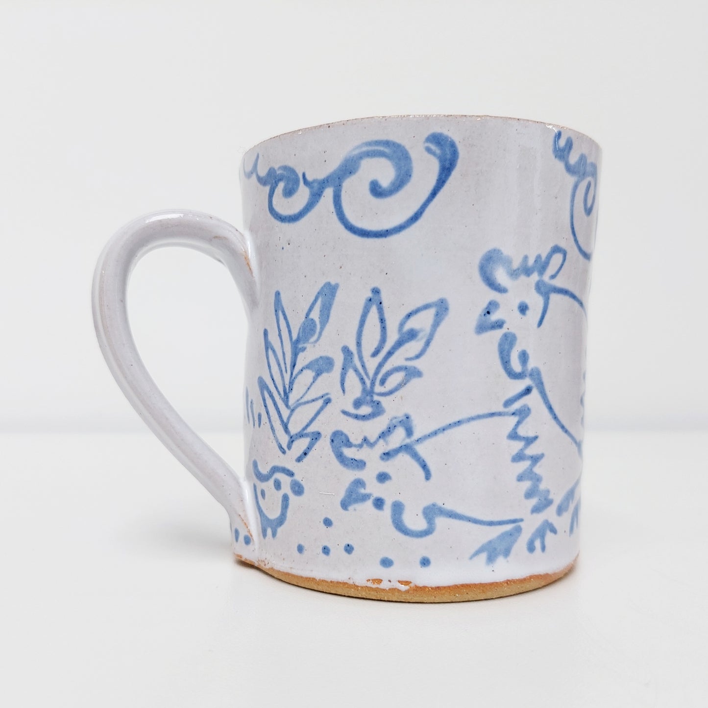 Handcrafted Earthenware Mug – Hans Ullrich | Blue & White Chicken Design
