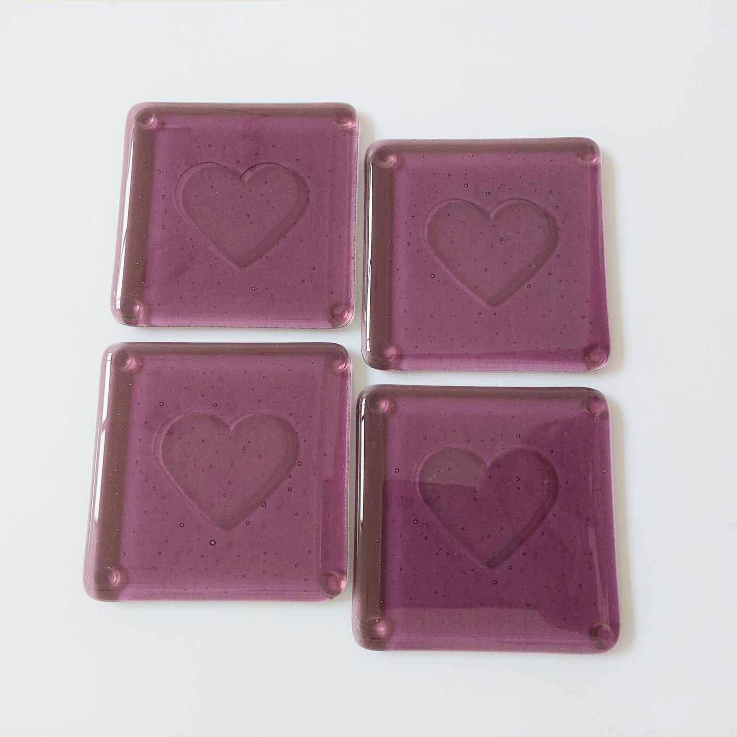 Plum Glass Coasters with a Kiln Carved Heart Design: Set of 4 Handmade Coasters