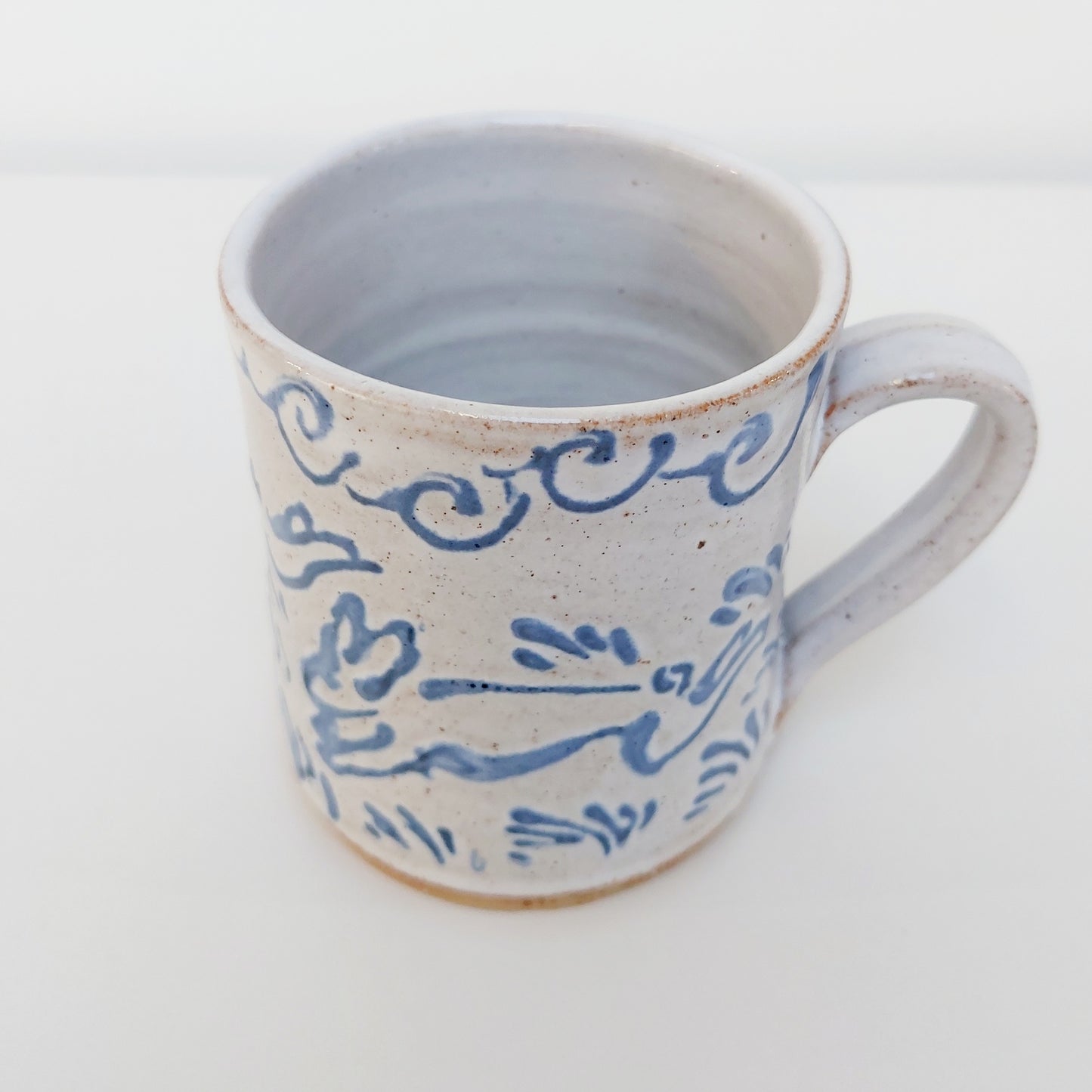 Handcrafted Earthenware Mug – Hans Ullrich | Blue & White Hare Design