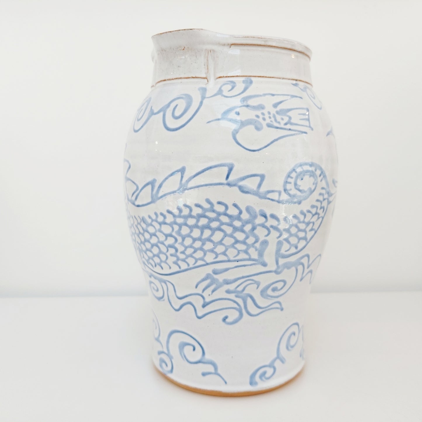 Large Blue & White Earthenware Jug with a Dragon Motif