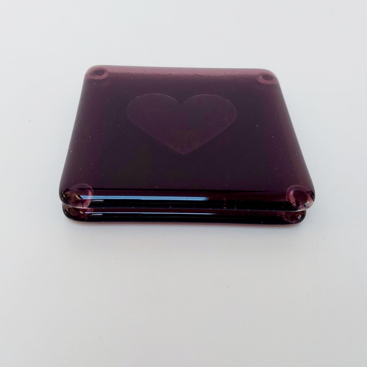Plum Glass Coasters with a Kiln Carved Heart Design