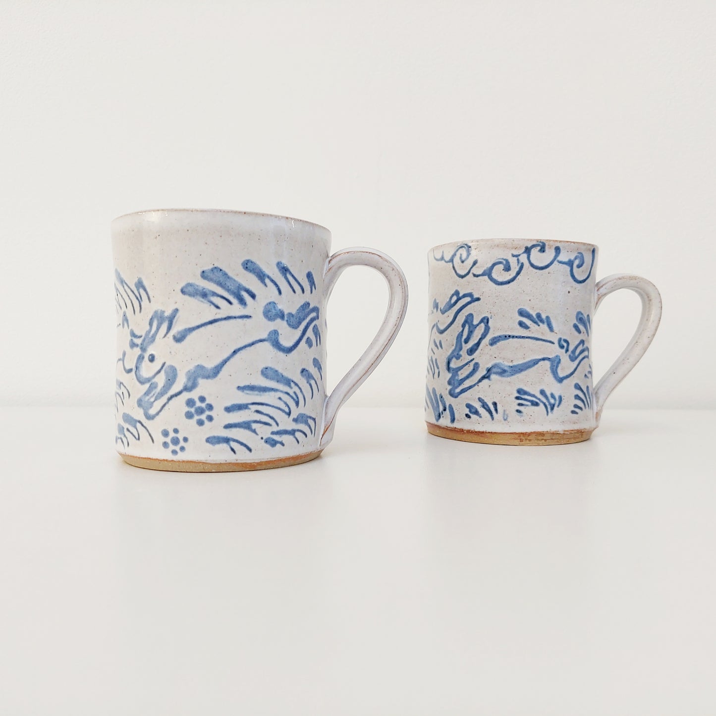Handcrafted Earthenware Mug – Hans Ullrich | Blue & White Hare Design