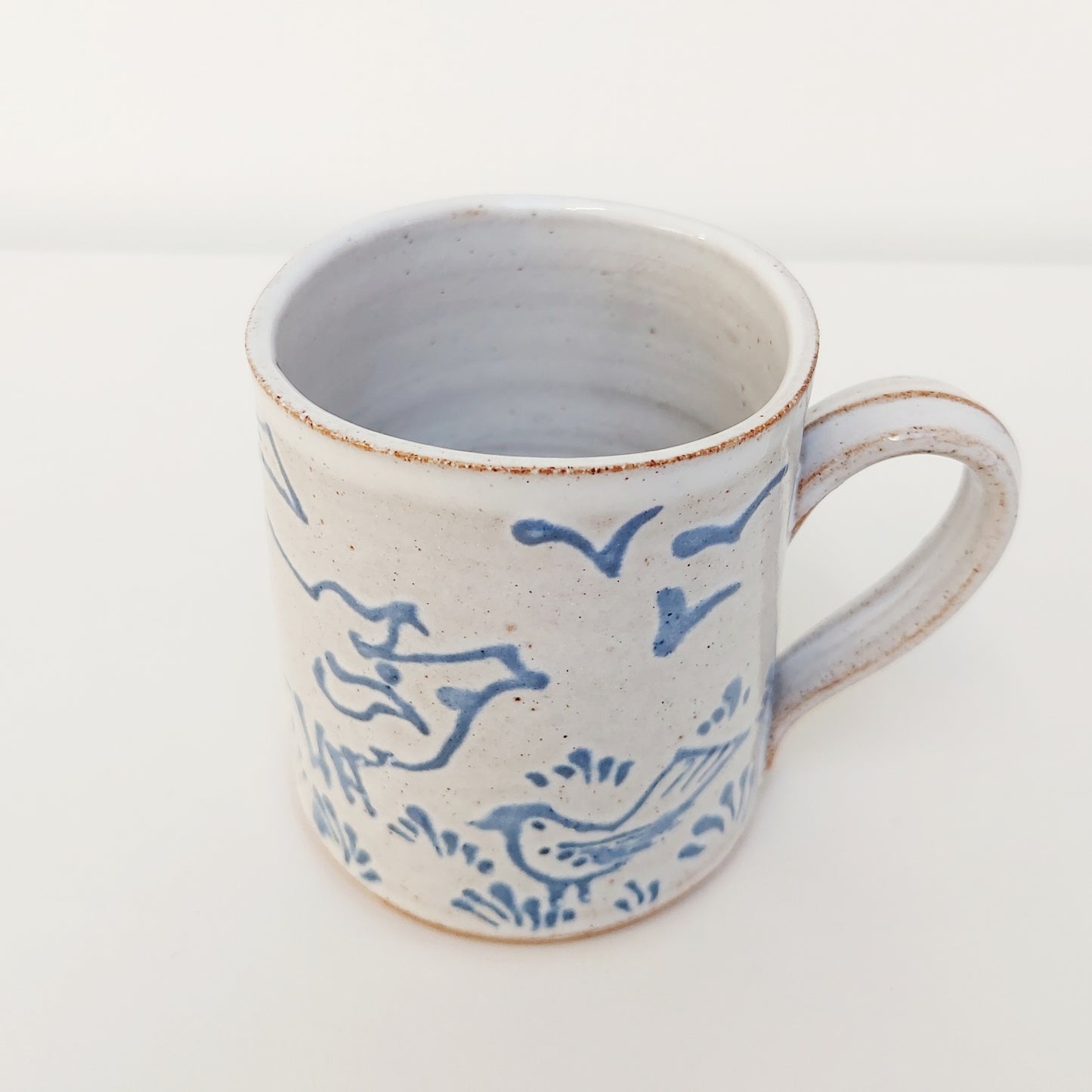 Handcrafted Earthenware Mug – Hans Ullrich | Blue & White Pig & Bird Design