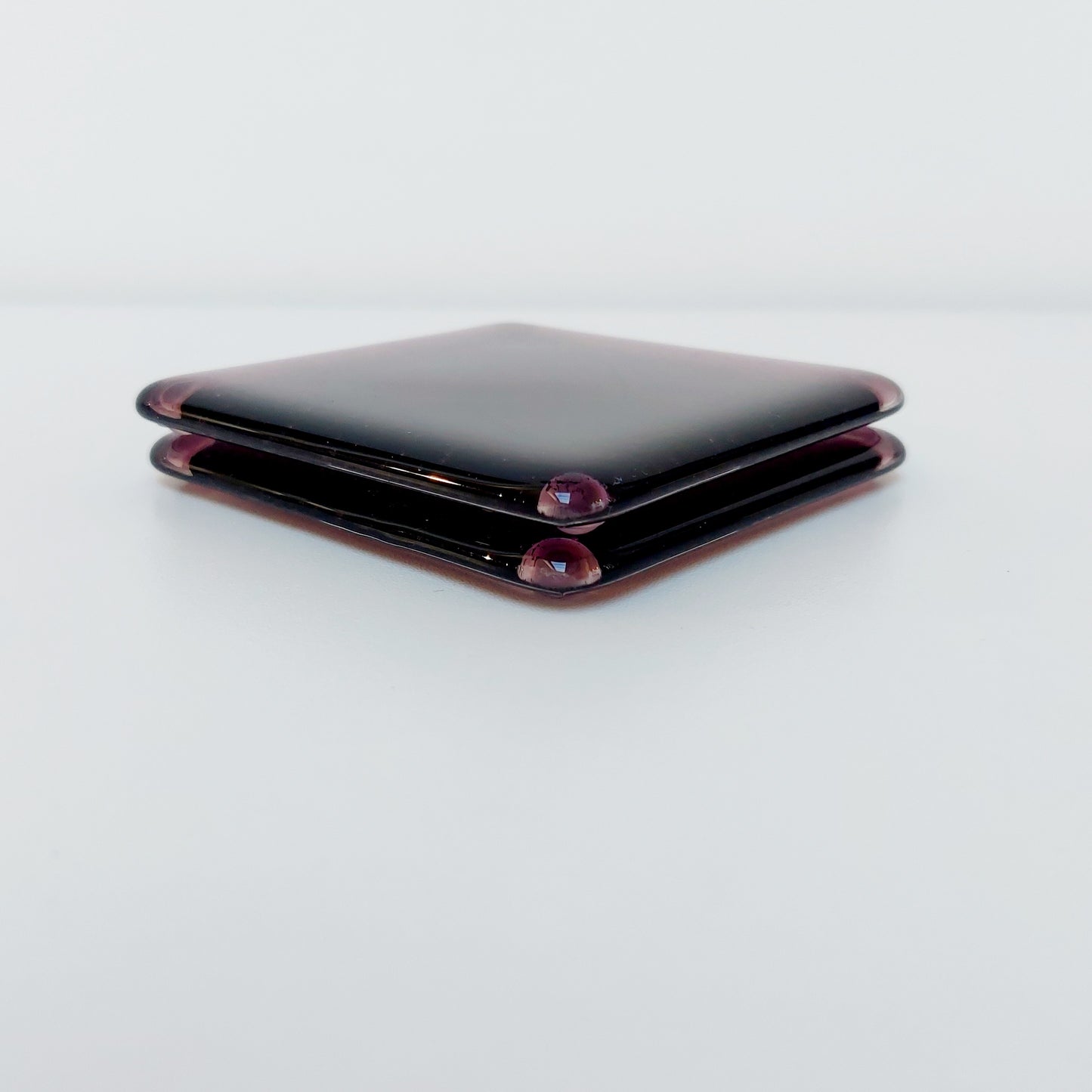 Plum Glass Coasters with a Kiln Carved Heart Design