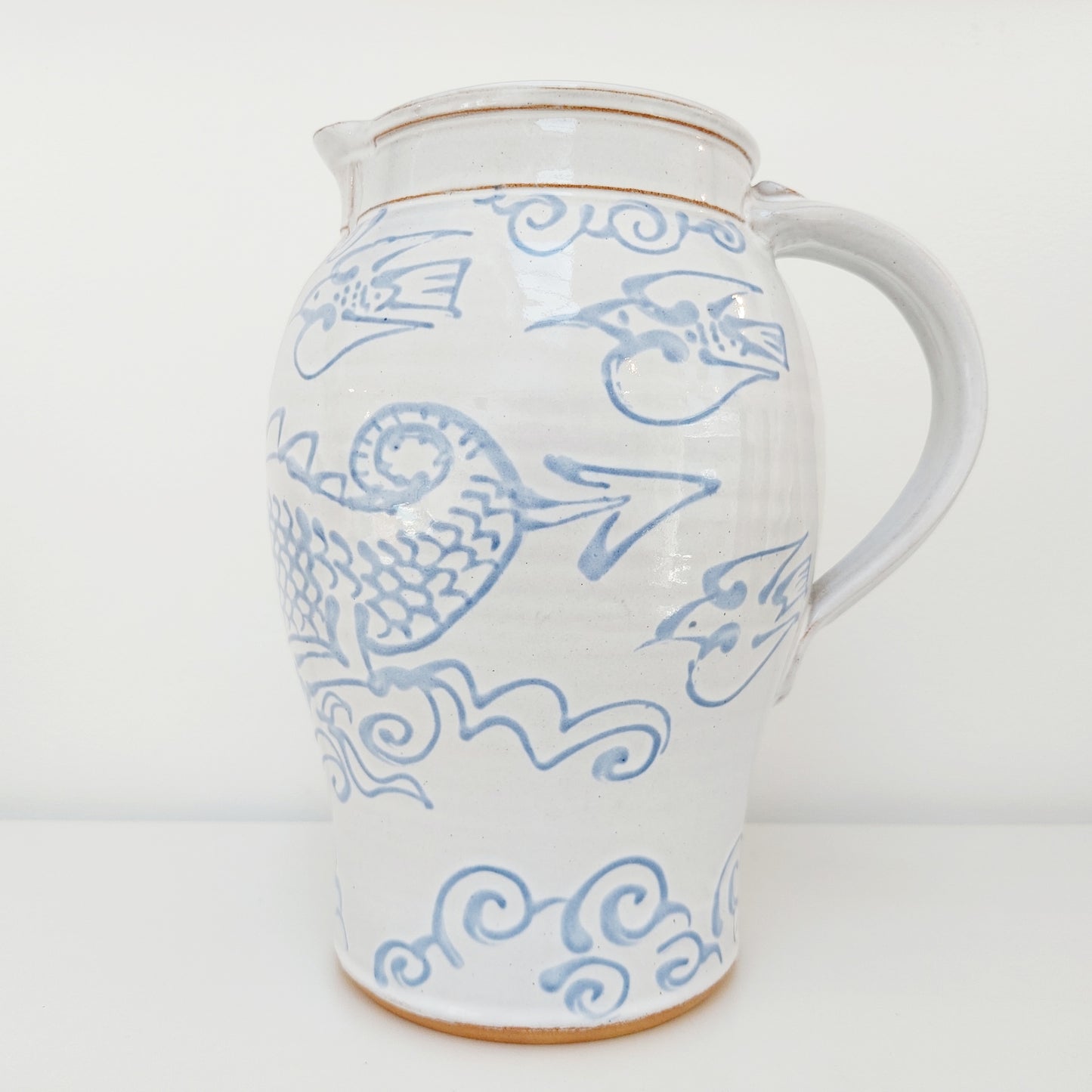 Large Blue & White Earthenware Jug with a Dragon Motif