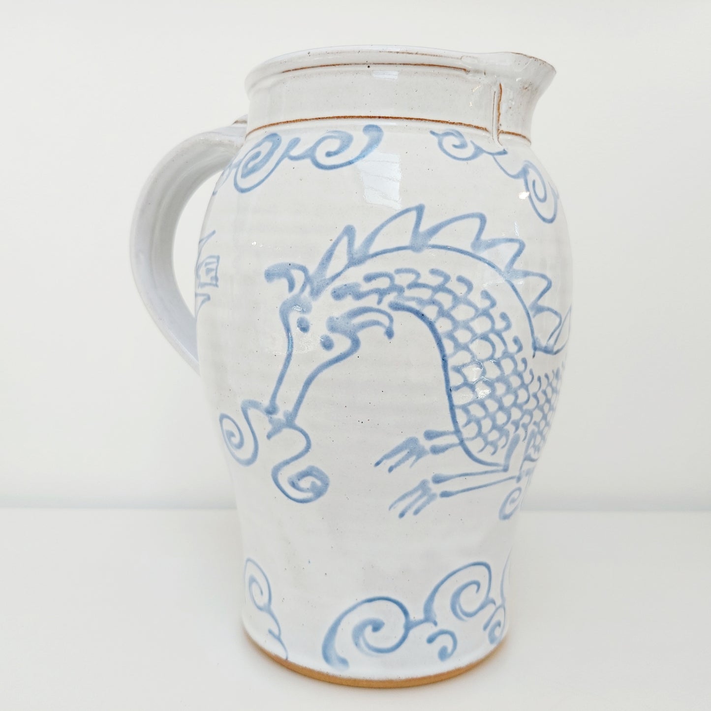 Large Blue & White Earthenware Jug with a Dragon Motif