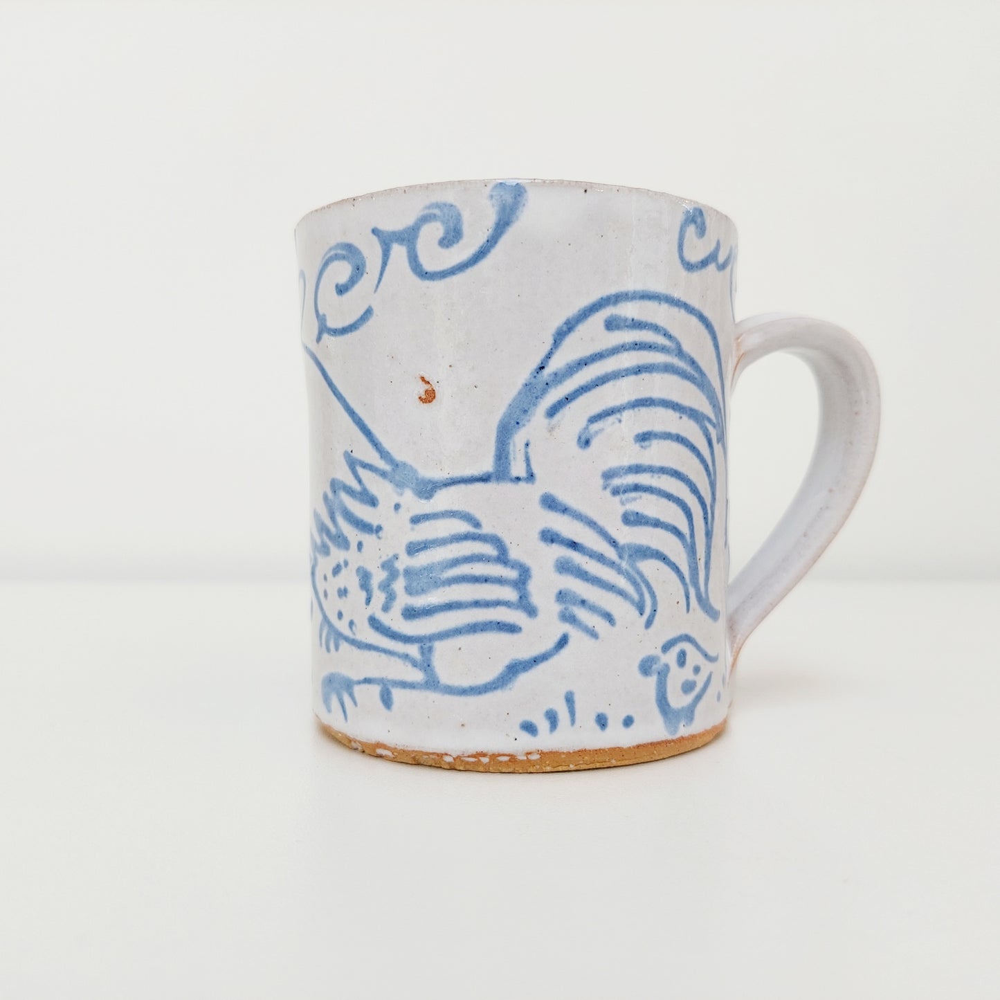 Handcrafted Earthenware Mug – Hans Ullrich | Blue & White Chicken Design