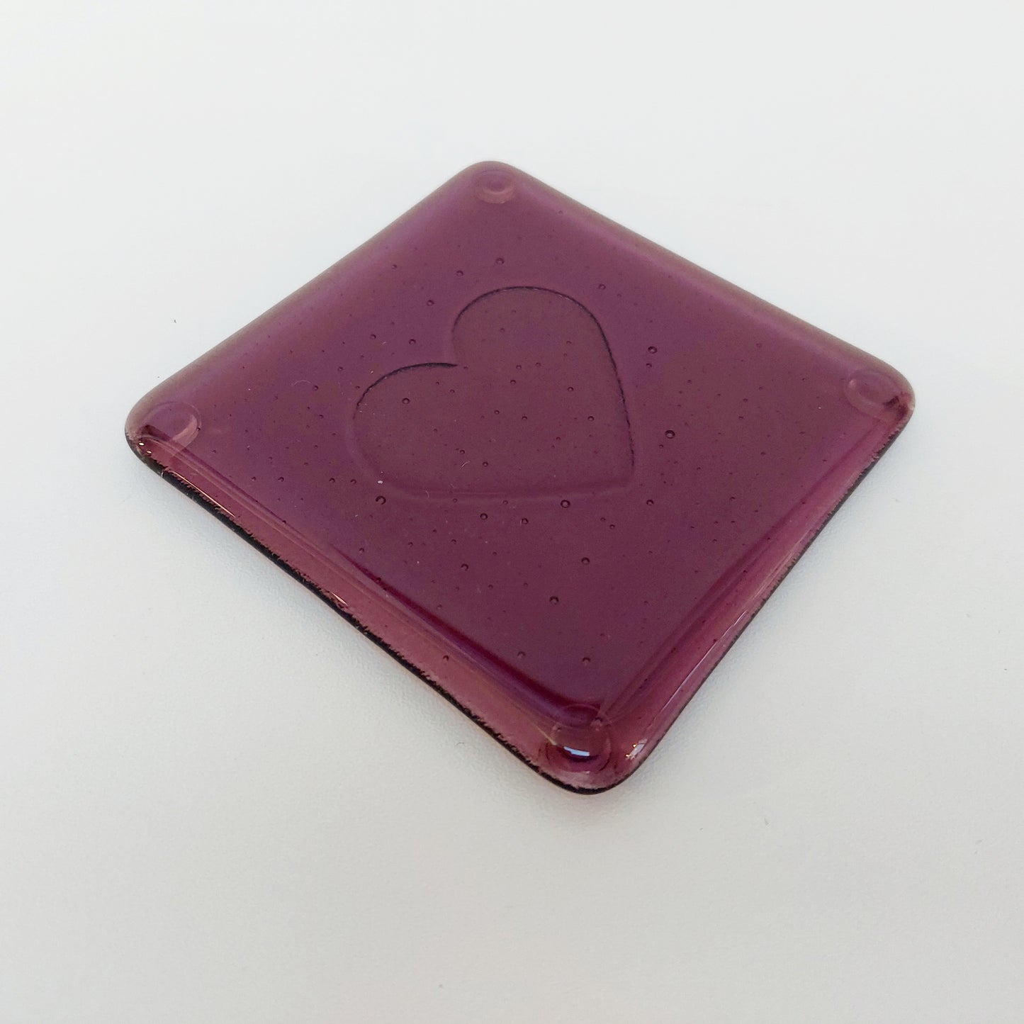 Plum Glass Coasters with a Kiln Carved Heart Design