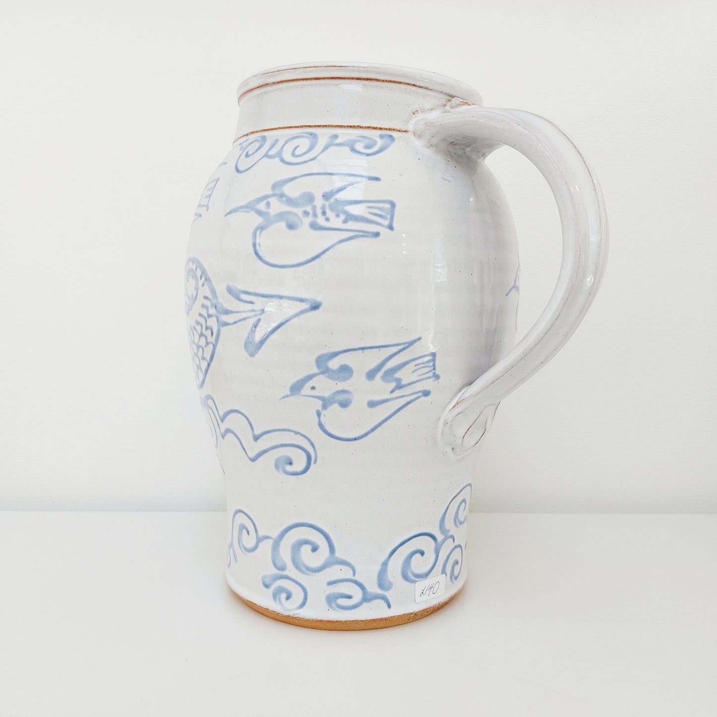 Large Blue & White Earthenware Jug with a Dragon Motif