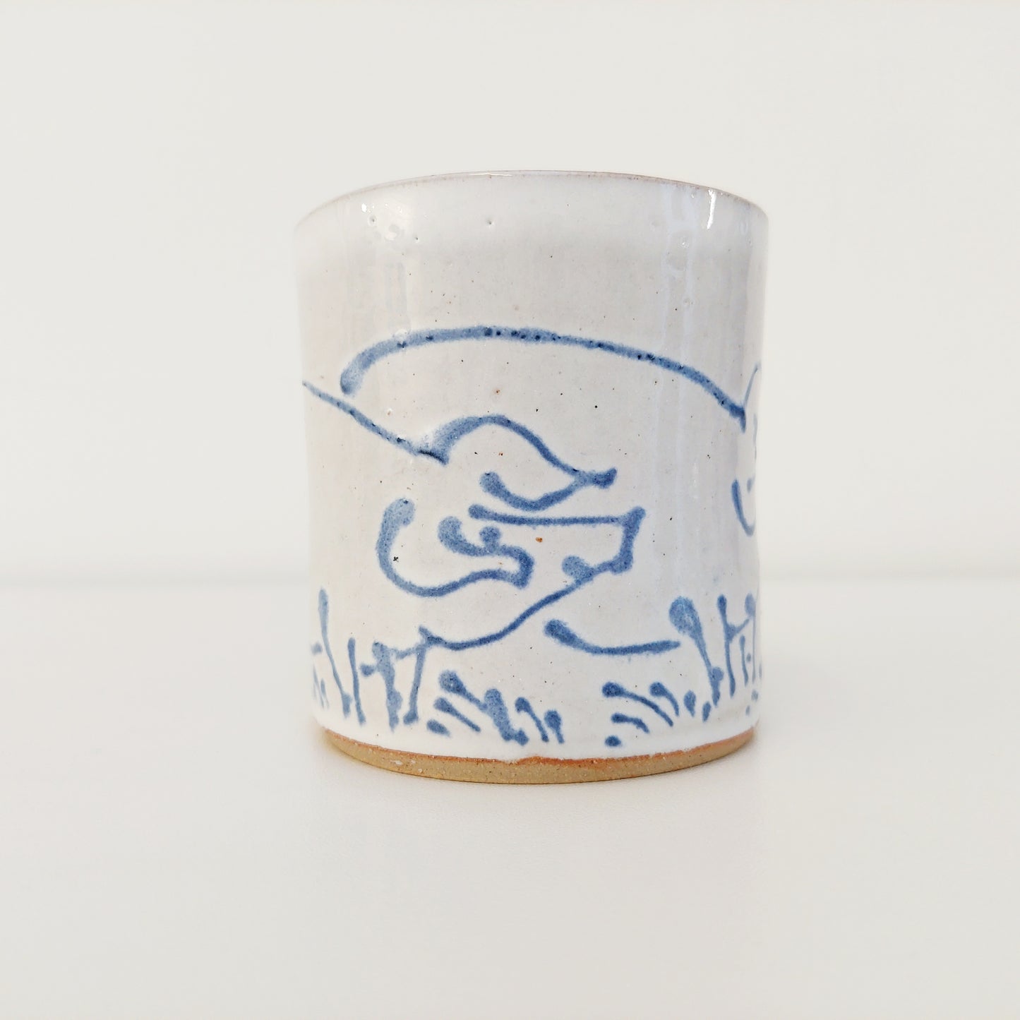 Handcrafted Earthenware Mug – Hans Ullrich | Blue & White Pig & Bird Design
