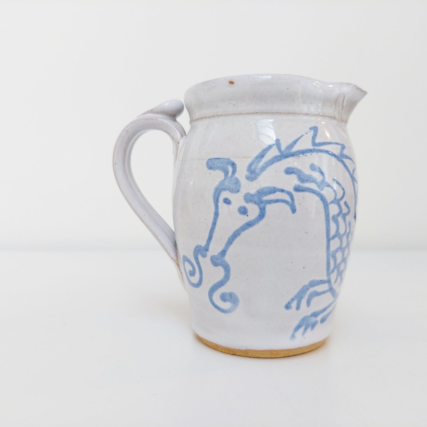 Blue & White Pottery Milk Jug with Dragon Motif