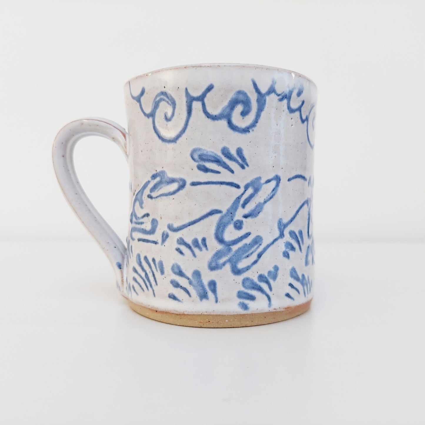 Handcrafted Earthenware Mug – Hans Ullrich | Blue & White Hare Design