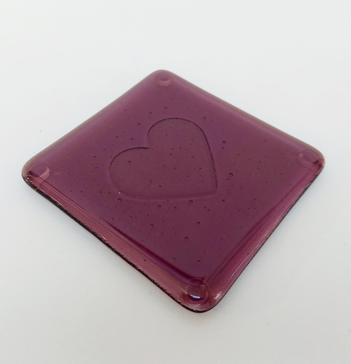 Plum Glass Coasters with a Kiln Carved Heart Design