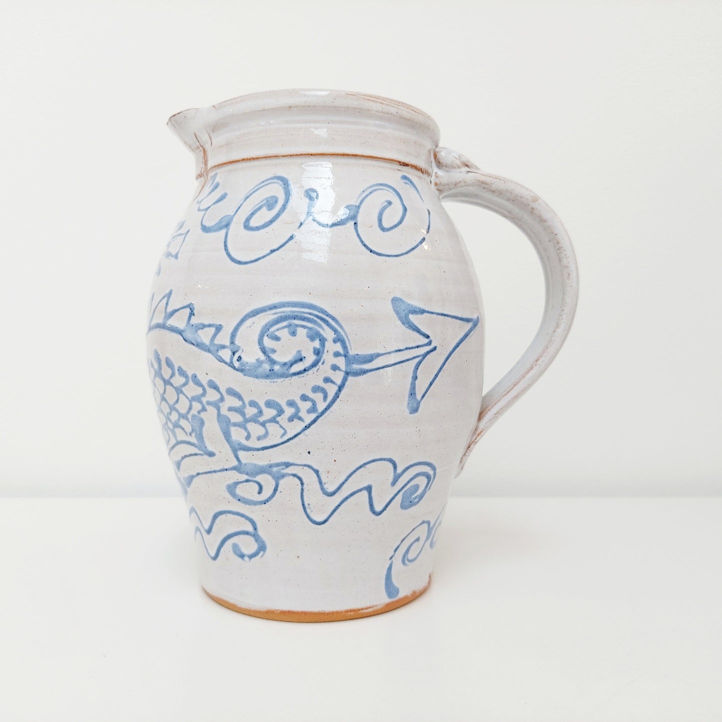 Blue & White Earthenware Jug with a Dragon Motif