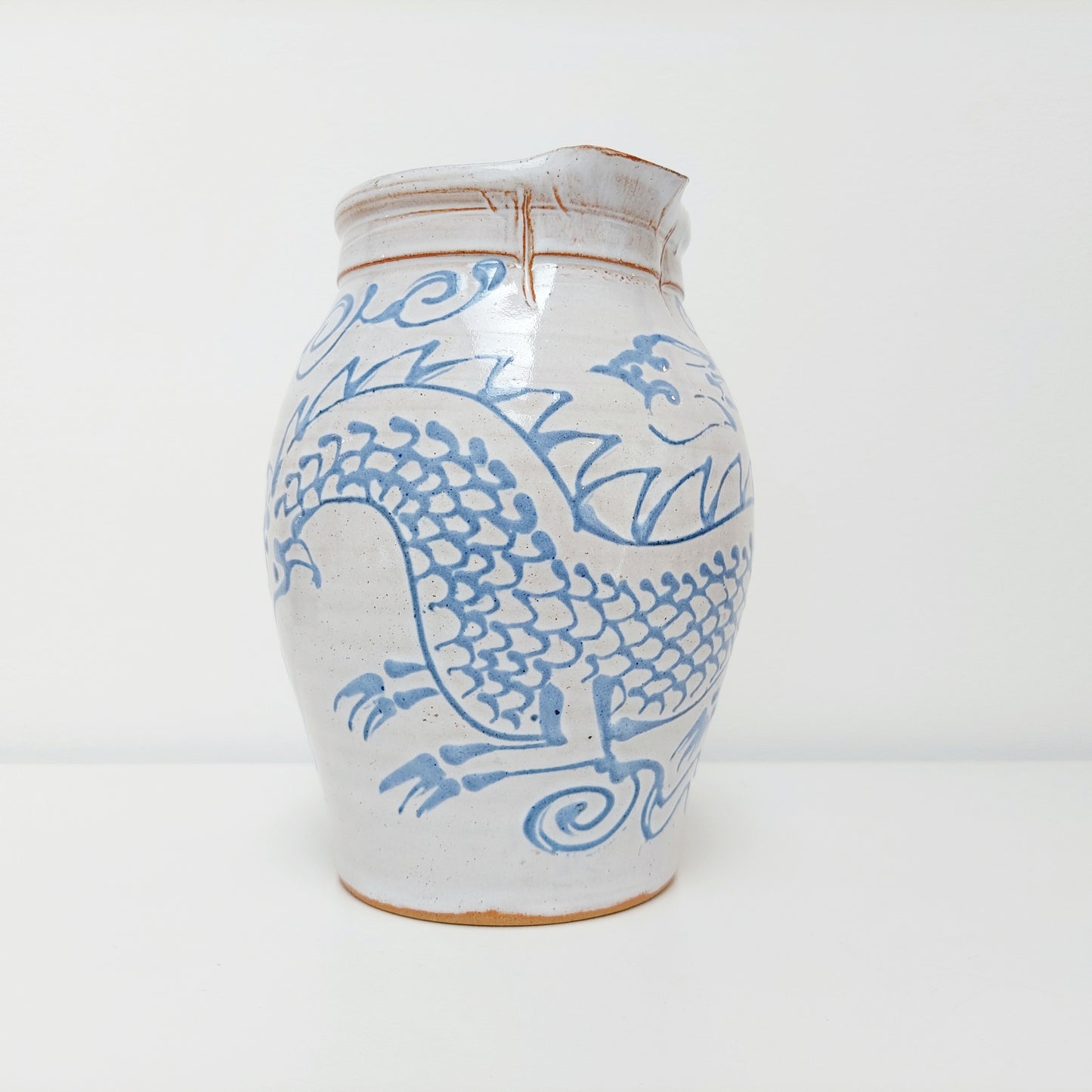 Blue & White Earthenware Jug with a Dragon Motif