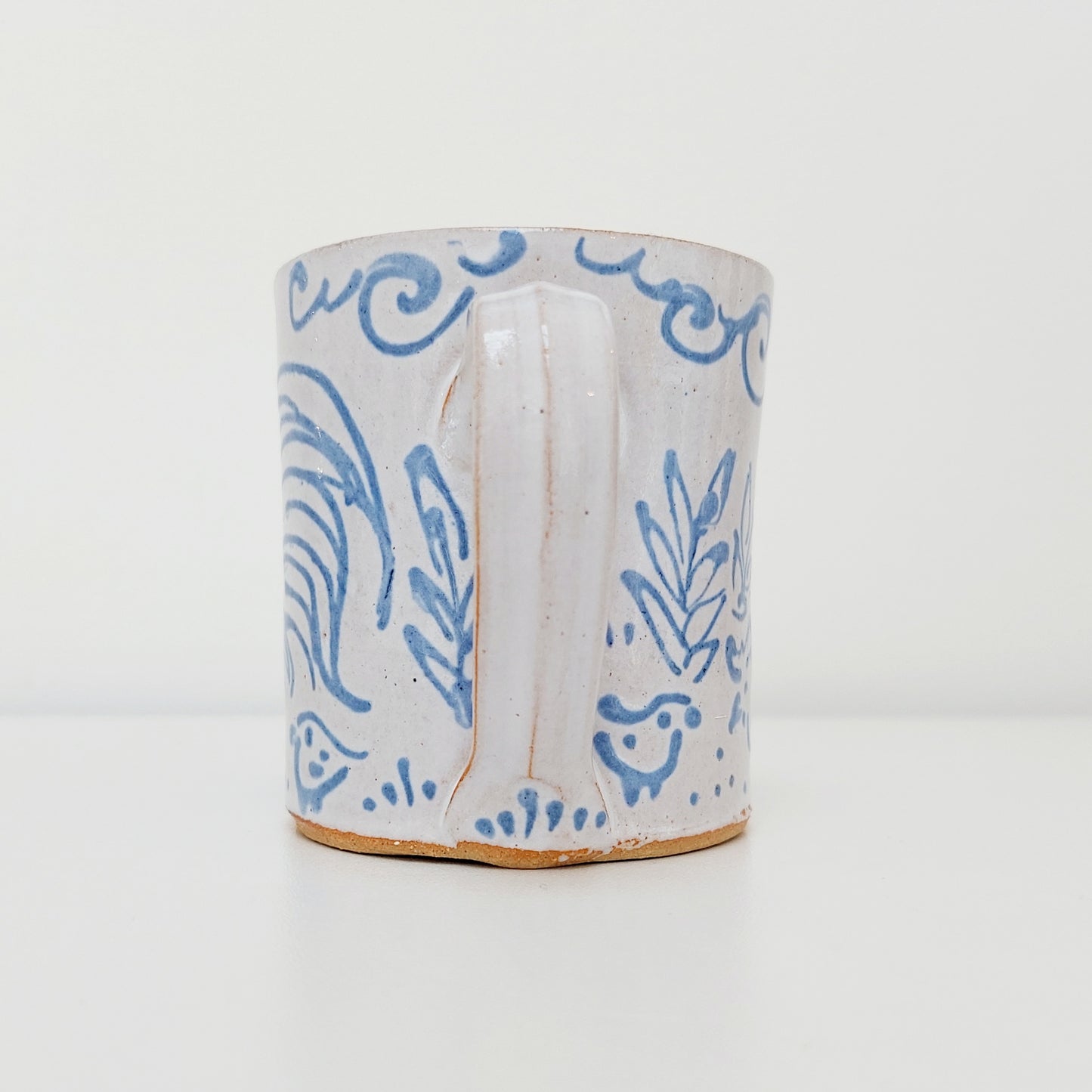 Handcrafted Earthenware Mug – Hans Ullrich | Blue & White Chicken Design