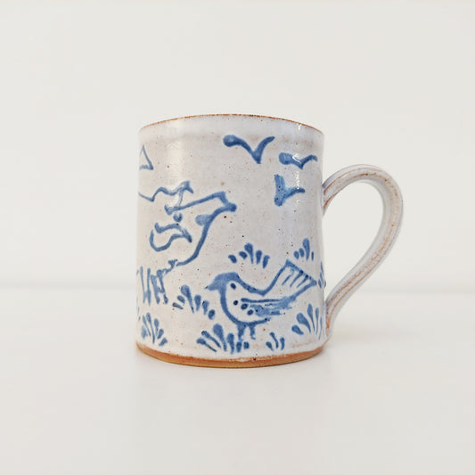 Handcrafted Earthenware Mug – Hans Ullrich | Blue & White Pig & Bird Design