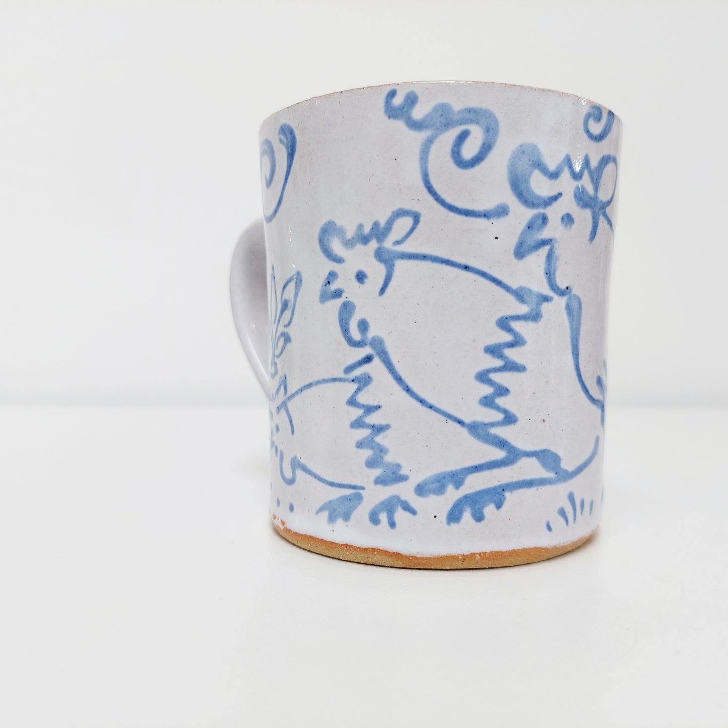 Handcrafted Earthenware Mug – Hans Ullrich | Blue & White Chicken Design