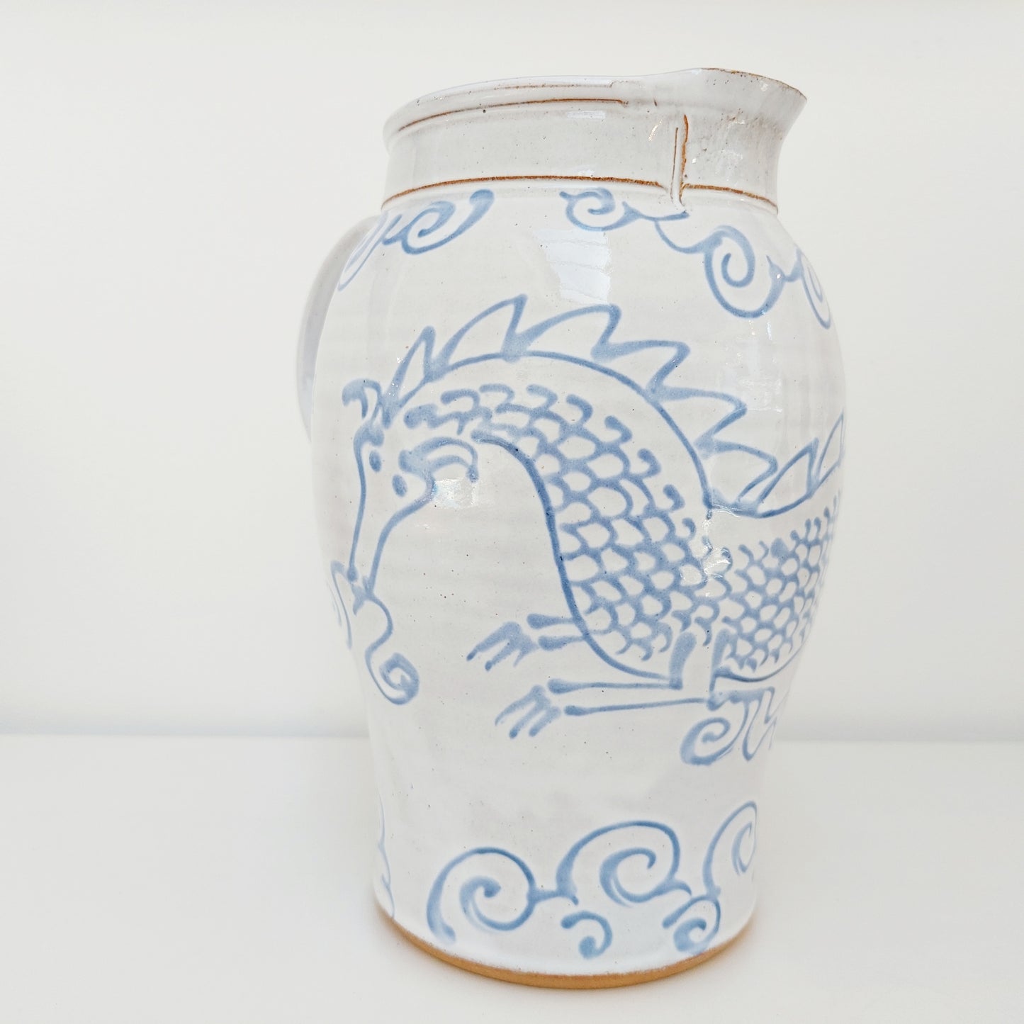 Large Blue & White Earthenware Jug with a Dragon Motif